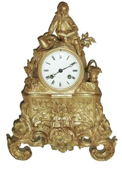 France, Japy Freres, ormolu figural clock depicting a young man with long hair and in period costume, his hat laying beside while he reads a book, flanked by a detailed basket of fruit with napkins, the upper portion supported by a base of floral sprays and rococo scrolls. The clock itself an early and quality Japy unit with silk thread suspension, and retaining original tre-foil hands, showing the time on a perfect porcelain dial, c1840