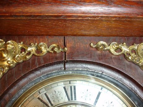 Lenzkirch, Germany, oak "Freischwinger" , with 34 pieces of polished brass trim, the fancy pendulum with a central bust, and crest with a facial casting of Diana with elaborate hair jewels. The dial flanked by two female caryatids, brass castings with good detail. The well made count wheel striking movement with strong Lenzkirch logo and serial Nr. 866,286 circa 1889.