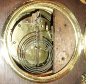 Lenzkirch, Germany, very rare burgundy porcelain / ormolu /and walnut, open well mantel clock, with cast pendulum, all in the French style., with over two dozen pieces of brass trim, some gilt, some silver or nickel plated, professionally restored, serial Nr. 654919, and with original brass + steel Lenzkirch key, C1880