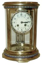 A.D. Mougin, French, 8 days, time and strike, spring brass movement oval brass and glass crystal regulator shelf clock with champleve enamel, c1900