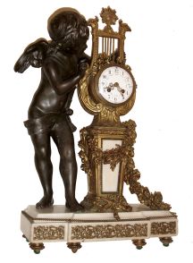 France, figural mantel clock, brass lyre case with bronze figure of putto inspecting clock on white marble base decorated with gilt trim, the lyre case with acanthus, floral garlands, and a large festoon of fruits and flowers, white enamel Arabic numeral dial with polychrome enamel decoration, gilt Louis XV style hands, 8 days, time and count wheel strike pendule a Paris movement, signed "AD. Mougin", c1870