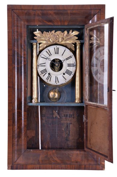 Hills, Goodrich & Co., Plainville, Conn., 8 day, time and strike, weight driven brass movement OG shelf clock with a partial overpasted J. J. Beals, Boston label. The movement was designed by Joseph Ives.