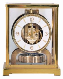 Jaeger LeCoultre, Switzerland, "Atmos" gilt brass and glass perpetual mantel clock, serial number 98063, front door hinges from side, in original green felt carrying box