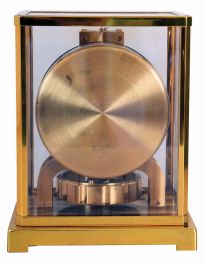 Jaeger LeCoultre, Switzerland, "Atmos" gilt brass and glass perpetual mantel clock, serial number 98063, front door hinges from side, in original green felt carrying box