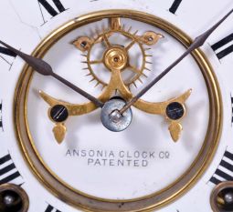 Ansonia Clock Co., New York, NY, "St. Clair", 8 day, time and strike spring driven movement enameled iron case mantel clock.