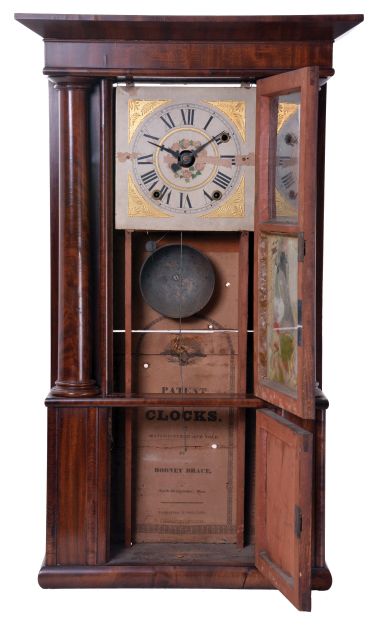 Rodney Brace, North Bridgewater, Mass Cornice and Full Column shelf clock with a 30 hour weight driven time, strike and alarm movement in a mahogany veneered case.