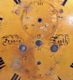 Tall Clock Dials- 8 (Eight) including round gilt "Fraser, Perth" Scotland, modern German, S. Thomas, Plymouth wooden dial, American wooden dial with Masonic symbols in arch, Armstrong, Manchester, England, generic painted iron dial, English painted iron dial with nautical scene and English painted iron dial with pastoral scene
