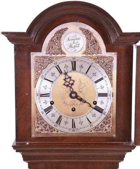 F.W. Elliot Ltd., Croydon, England, dwarf tall clock, 8 day, time, strike and chime playing Whittington and Westminster tunes, spring driven movement with balance wheel in a mahogany case with brass dial and silvered chapter ring, serial #15457