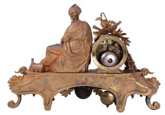 Japy Freres, Paris, France, figural mantel clock, 8 day time and strike, count wheel and bell, spring driven movement with floral themed ceramic dial and insets in a gilt spelter case featuring a seated female figure surrounded by symbols of art and science including a pitcher, gear, paintbrush & pallet, books, steam engine, anvil, spyglass, and square.