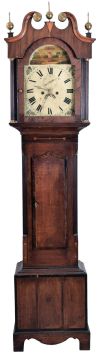 English, 8 day tall clock, time and bell strike, weight driven movement in a mixed veneer/ mahogany inlaid oak case with broken arch top set with brass rosettes and finials, flat reeded pilasters flanking door, painted arch dial with calendar and seconds hand.