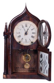 Brewster & Ingrahams, Bristol, Conn., 8 day, time and strike spring driven movement 4-column,Gothic onion top shelf clock.