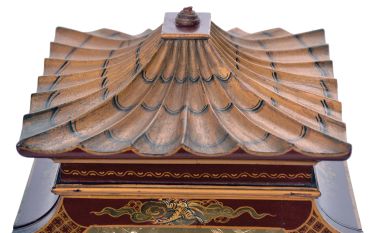 English, 8 day, time and strike spring driven, three train lever movement Westminster chime mantel clock in an Oriental-style gold and red Chinoiserie decorated case.