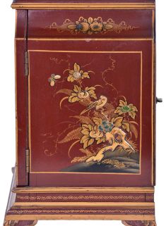 English, 8 day, time and strike spring driven, three train lever movement Westminster chime mantel clock in an Oriental-style gold and red Chinoiserie decorated case.