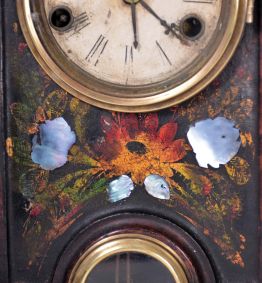 Unsigned Gothic style iron front shelf clock, attributed to the American Clock Co., NYC, with a 30 hour spring driven time and strike movement in a painted iron case with MOP inlay.