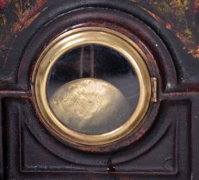 Unsigned Gothic style iron front shelf clock, attributed to the American Clock Co., NYC, with a 30 hour spring driven time and strike movement in a painted iron case with MOP inlay.
