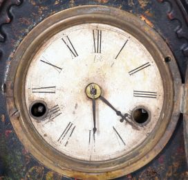 Unsigned Gothic style iron front shelf clock, attributed to the American Clock Co., NYC, with a 30 hour spring driven time and strike movement in a painted iron case with MOP inlay.