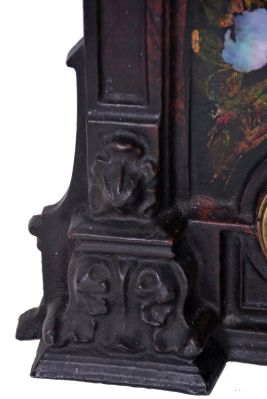Unsigned Gothic style iron front shelf clock, attributed to the American Clock Co., NYC, with a 30 hour spring driven time and strike movement in a painted iron case with MOP inlay.
