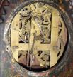 Unsigned Gothic style iron front shelf clock, attributed to the American Clock Co., NYC, with a 30 hour spring driven time and strike movement in a painted iron case with MOP inlay.