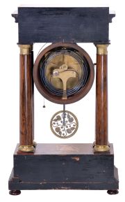Austria, a mid 19th century portico clock with grand sonnerie striking, the case with rosewood veneers, ripple moldings, and contrasting, foliate marquetry, the columns with cast capitals and bases, Roman numeral silvered dial, blued steel hands, two day brass movement sounding the quarters in passing, and repeating the last hour and quarter on demand, silk suspended pendulum with engine turned rim, and decorative, pierced center