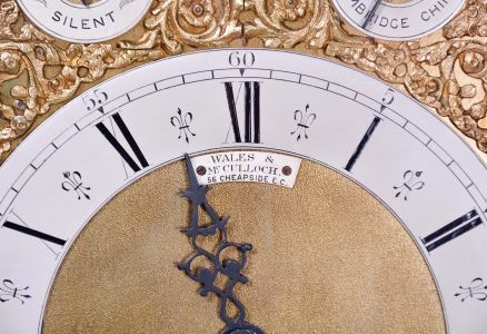 English, 8 day, time and strike three train 8 bell chiming bracket clock playing Whittington/Cambridge chimes. Retailed by Wales & McCulloch, 56 Cheapside. E.C., now in a later case.