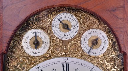 English, 8 day, time and strike three train 8 bell chiming bracket clock playing Whittington/Cambridge chimes. Retailed by Wales & McCulloch, 56 Cheapside. E.C., now in a later case.