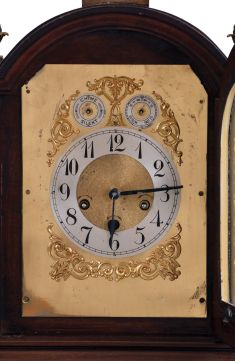Germany, Junghans, 8 day, Westminster Chime, mahogany cased Georgian style bracket clock with fancy arched dial and pineapple finials