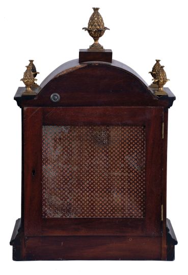 Germany, Junghans, 8 day, Westminster Chime, mahogany cased Georgian style bracket clock with fancy arched dial and pineapple finials