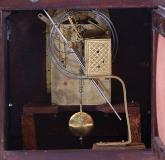 Germany, Junghans, 8 day, Westminster Chime, mahogany cased Georgian style bracket clock with fancy arched dial and pineapple finials