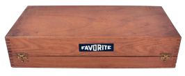 Favorite brand mainspring winder set in a wooden case. Set contains: one winding frame to be held in a bench vise, two cranks, and eight arbors with barrels. For use on clocks and music boxes.