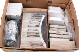 Clock parts including partial and complete cases, glass domes, finials, banjo brackets, chime rods, spring barrels, hands, pendulum bobs, dials, and other useful items. One of the partial cases is from a Welch, Spring & Co. "Patti" model. 8 (Eight) boxes total.