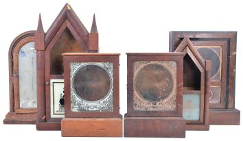 Clock parts including partial and complete cases, glass domes, finials, banjo brackets, chime rods, spring barrels, hands, pendulum bobs, dials, and other useful items. One of the partial cases is from a Welch, Spring & Co. "Patti" model. 8 (Eight) boxes total.