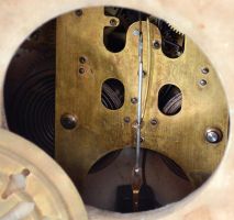 Ansonia Clock Co., New York, unidentified model shelf clock with an 8 day spring driven time and strike visible escapement movement in a white onyx case.
