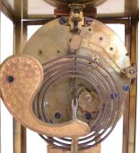 Clocks- 2 (Two) American: (1) Ansonia Clock Co., Brookline NY, "Prism" crystal regulator, 8 day time and strike, spring driven with visible escapement; (2) New Haven Clock Co., New Haven CT, "Arnold" metal case mantel clock, 8 day, time and strike with porcelain dial.