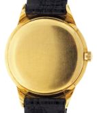 Patek, Philippe & Cie., Geneva, Switzerland, mans "Calatrava" wrist watch, ref. 2568-3, cal. 23 - 300, 18 jewels, manual winding, adjusted to 5 positions, temperature and isochronism, cotes de Geneve decorated nickel bar movement with Geneva seal, and lever escapement with free sprung gyromax balance in an 18 karat, yellow gold case with sculpted lugs, baton marker metal dial and gold baton hands, with crocodile strap, serial #785958, 32.5mm, 31.3g TW.