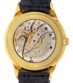 Patek, Philippe & Cie., Geneva, Switzerland, mans "Calatrava" wrist watch, ref. 2568-3, cal. 23 - 300, 18 jewels, manual winding, adjusted to 5 positions, temperature and isochronism, cotes de Geneve decorated nickel bar movement with Geneva seal, and lever escapement with free sprung gyromax balance in an 18 karat, yellow gold case with sculpted lugs, baton marker metal dial and gold baton hands, with crocodile strap, serial #785958, 32.5mm, 31.3g TW.
