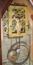 J. C. Brown, Forestville Manufacturing Co., Bristol, Conn., miniature steeple shelf clock with a 30 hour spring driven time and strike movement in a mahogany veneered case. Signed 30-hr time and strike movement.