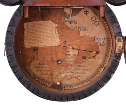 E. Ingraham & Co., Bristol, Conn., "Ionic", 8 day, time and strike spring driven movement wall clock.