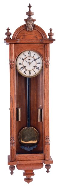 Ansonia Clock Co., New York, NY, "Capitol", 8 day, time only double weight driven, brass movement wall timepiece.