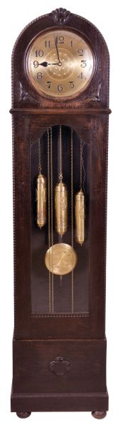 Germany, tall clock, 8 day, time, strike and chime on gongs, three embossed brass weight driven movement with matching pendulum bob in a dark oak case with beveled glass door and round top with convex glass and brass dial