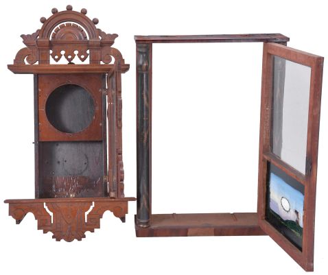Clock Cases -2 (Two): (1) Case for a Seth Thomas "Eclipse" model wall hanging clock, c1890; (2) Partial case for a short stenciled half column wooden works shelf clock, c1830.