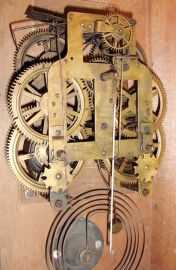American Clock Co., New York, attribution fancy cast iron front mantel clock with an 8 day spring driven time and strike movement (marked S. Thomas, Plymouth, Conn.) .