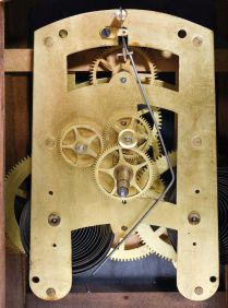 Clocks- 4 (Four) American spring driven gallery clocks: 2 (Two) Seth Thomas double sided; Seth Thomas single sided 30 day duration; Sessions in a carved oak case