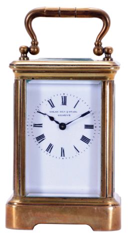 Golay, Fils & Stahl, Geneve, Mignonette #1 carriage clock, brass Corniche case set with beveled glasses, Roman numeral white enamel dial, blued steel hands, 8 day timepiece movement with lever platform