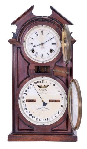 Ithaca Calendar Clock Co., Ithaca, NY, "No. 8 Shelf Library" with a spring driven 30 day Hubbell time only movement and a perpetual calendar mechanism in a walnut case.