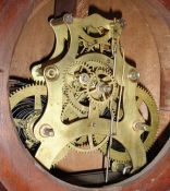 Ithaca Calendar Clock Co., Ithaca, NY, "No. 8 Shelf Library" with a spring driven 30 day Hubbell time only movement and a perpetual calendar mechanism in a walnut case.