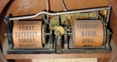 Ithaca Calendar Clock Co., Ithaca, NY, "No. 8 Shelf Library" with a spring driven 30 day Hubbell time only movement and a perpetual calendar mechanism in a walnut case.