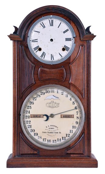 Ithaca Calendar Clock Co., Ithaca, NY, "No. 8 Shelf Library" with a spring driven, 8 day, time and strike movement and a perpetual calendar mechanism in a walnut case.