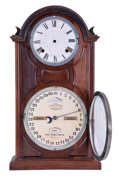 Ithaca Calendar Clock Co., Ithaca, NY, "No. 8 Shelf Library" with a spring driven, 8 day, time and strike movement and a perpetual calendar mechanism in a walnut case.