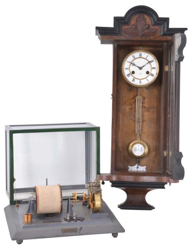 Clock and Anenometer- Junghans Vienna regulator spring driven wall clock and a Friez Instruments Baltimore glass encased anemometer.
