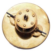 German 400-Day or Anniversary clock: (Retailer =Kuehl Clock Company, Chicago), time only spring driven movement torsion pendulum movement by Gustav Becker of Freiburg, Germany with disc pendulum in polished brass case under glass dome, c1910.